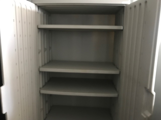 Tall cream colored storage cabinet 1.2