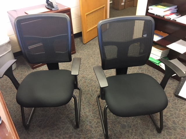 black stationary guest chairs